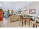 Open concept space with dining and living areas that are brightly lit and offer a relaxed atmosphere at 14 Escondido Ct # 134, Altamonte Springs, FL 32701
