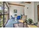 Relaxing screened patio with a ceiling fan and comfortable seating at 14 Escondido Ct # 134, Altamonte Springs, FL 32701