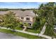 Aerial view of home showcasing landscaping and a well maintained lawn at 14474 Prunningwood Pl, Winter Garden, FL 34787