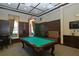 Inviting game room featuring a classic billiards table and comfortable seating, perfect for relaxing at 14474 Prunningwood Pl, Winter Garden, FL 34787