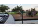 Community playground with modern play equipment, basketball court, and lush green surroundings at 14474 Prunningwood Pl, Winter Garden, FL 34787