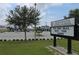 Exterior of Bridgewater Middle School in a community, with a parking lot and landscaping at 14474 Prunningwood Pl, Winter Garden, FL 34787