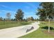 Outdoor skate park with winding sidewalk and manicured landscaping, perfect for enjoying a day in the sun at 14474 Prunningwood Pl, Winter Garden, FL 34787