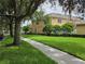 Exterior street view displaying well-maintained sidewalks and lush landscaping at 14474 Prunningwood Pl, Winter Garden, FL 34787