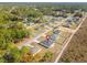 Aerial view of a home with a spacious backyard and a pin showing the property's location at 16730 Sw 50Th Cir, Ocala, FL 34473