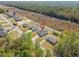 Aerial view shows home nestled in a neighborhood close to forest, indicated with a pin drop at 16730 Sw 50Th Cir, Ocala, FL 34473