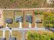 Aerial view of the home with property lines outlined in red, in a neighborhood close to forest at 16730 Sw 50Th Cir, Ocala, FL 34473