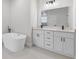 Bright bathroom boasts a freestanding tub, dual sink vanity, and modern fixtures at 16730 Sw 50Th Cir, Ocala, FL 34473