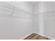 A view of the white wire shelving system in this walk-in closet space at 16730 Sw 50Th Cir, Ocala, FL 34473
