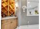 Custom bar area with wine storage, counter space, and elegant decor at 1810 Oakbrook Dr, Longwood, FL 32779