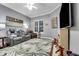 Bonus room with a fireplace, television and reclining chairs, creating a relaxing space at 1810 Oakbrook Dr, Longwood, FL 32779