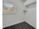 Pantry room with black marble floor and white walls at 1850 Shawnee Trl, Maitland, FL 32751