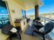 Balcony featuring comfortable outdoor seating and a built-in outdoor grill at 1925 S Atlantic Ave # 411, Daytona Beach, FL 32118