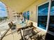Balcony featuring patio dining furniture and city views at 1925 S Atlantic Ave # 411, Daytona Beach, FL 32118