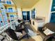 Balcony featuring outdoor seating and a built-in grill at 1925 S Atlantic Ave # 411, Daytona Beach, FL 32118
