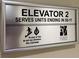 Sign for Elevator 2. 'In case of fire, do not use elevators, use stairways' at 1925 S Atlantic Ave # 411, Daytona Beach, FL 32118
