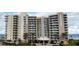 Multi-story beachfront condo building boasts ocean views from private balconies and lush landscaping in a serene setting at 1925 S Atlantic Ave # 411, Daytona Beach, FL 32118