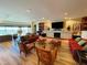 Resident lounge featuring comfortable sofas, fireplace, flat-screen TV, and ocean views at 1925 S Atlantic Ave # 411, Daytona Beach, FL 32118