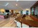 Resident lounge with dining area, pool table and fireplace with multiple seating areas at 1925 S Atlantic Ave # 411, Daytona Beach, FL 32118
