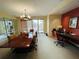 Conference room with large table, office space, and modern decor at 1925 S Atlantic Ave # 411, Daytona Beach, FL 32118