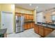 Spacious kitchen featuring a stainless steel refrigerator and ample counter space at 2063 Killinger St, Deltona, FL 32738