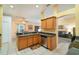 Charming kitchen with stainless steel appliances and tile flooring at 2063 Killinger St, Deltona, FL 32738