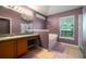Relaxing main bathroom featuring a soaking tub and vanity at 2063 Killinger St, Deltona, FL 32738
