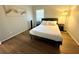 Bedroom features include hardwood floors, window, and a neutral color scheme at 2357 Rio Pinar Lakes Blvd, Orlando, FL 32822