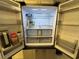Spacious refrigerator with well-lit interior and multiple compartments at 2357 Rio Pinar Lakes Blvd, Orlando, FL 32822