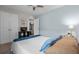 Bright bedroom with a closet, tv, and comfortable bed at 2620 Waterline St, Kissimmee, FL 34743