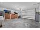 Spacious two-car garage with ample storage space and a roll-up door at 2620 Waterline St, Kissimmee, FL 34743