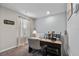 Bright home office space with a functional desk, ample lighting, and a cozy atmosphere at 2620 Waterline St, Kissimmee, FL 34743