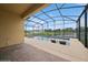 Private pool with lounge chairs inside a screened enclosure at 2659 Magpie Way, Sanford, FL 32773