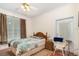 Cozy bedroom with warm lighting and a ceiling fan at 2691 Phillips Rd, Christmas, FL 32709