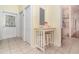 Hallway area with small table and extra storage space at 2691 Phillips Rd, Christmas, FL 32709