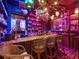Home bar featuring full bar, bamboo trim, and tiki decor and lighting at 2750 Lee Shore Loop, Orlando, FL 32820