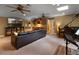 Finished basement features a wet bar, large leather couch, dining area, and music setup at 2750 Lee Shore Loop, Orlando, FL 32820