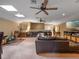 Finished basement features a wet bar, leather couch, dining area, and an entertainment center at 2750 Lee Shore Loop, Orlando, FL 32820
