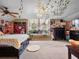 Spacious bedroom with ivy accents, string lights, with a comfortable bed, and desk area at 2750 Lee Shore Loop, Orlando, FL 32820