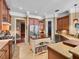 Spacious kitchen with central island, granite countertops, stainless appliances, and ample storage at 2750 Lee Shore Loop, Orlando, FL 32820