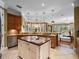 Bright kitchen with large island and sink, stainless steel appliances, and great natural light at 2750 Lee Shore Loop, Orlando, FL 32820