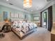 Relaxing main bedroom with a sitting area and view to the outdoors at 2750 Lee Shore Loop, Orlando, FL 32820