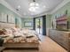 Main bedroom features a spacious layout and serene color palette at 2750 Lee Shore Loop, Orlando, FL 32820