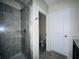Bathroom with tiled stand up shower and neutral paint at 2807 Alder Berry Blvd, Ocoee, FL 34761