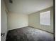Bedroom with neutral paint, carpet and window at 2807 Alder Berry Blvd, Ocoee, FL 34761