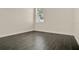 Cozy bedroom with wood floors, base trim and a window at 289 Laurenburg Ln, Ocoee, FL 34761
