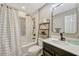Stylish bathroom with decorative tile accent, modern fixtures, and shower at 2943 Slippery Rock Ave, Orlando, FL 32826