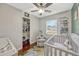 Bright Bedroom with hardwood floors, closet, and natural light at 2943 Slippery Rock Ave, Orlando, FL 32826