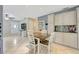 Open dining area connects seamlessly to the living room, featuring tile floors and a kitchen view at 2943 Slippery Rock Ave, Orlando, FL 32826