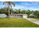 Charming single-story home with a well-maintained lawn and a welcoming front entrance at 2943 Slippery Rock Ave, Orlando, FL 32826